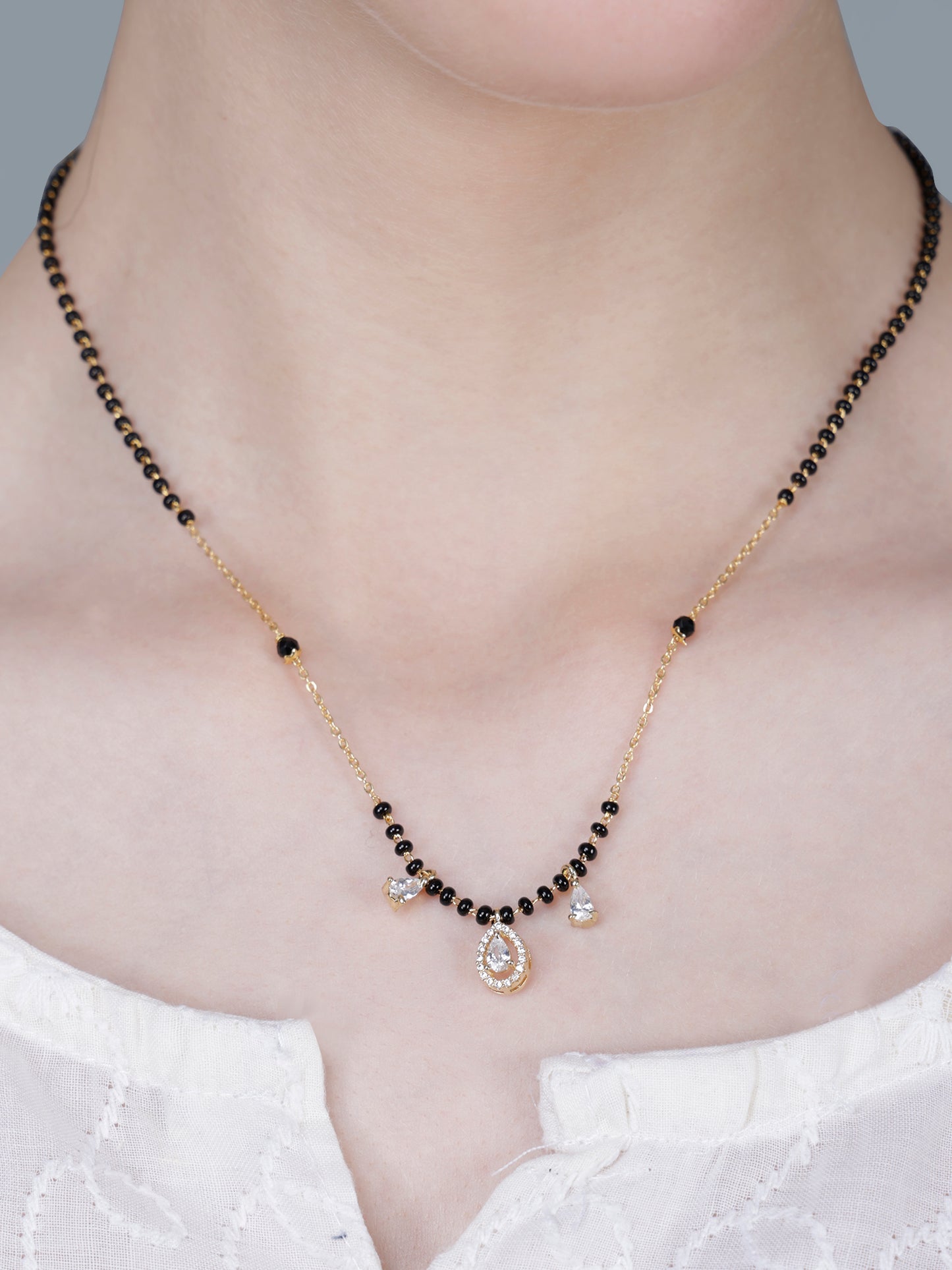 Graceful Black Bead Gold-Plated Teardrop Mangalsutra Necklace with Sparkling Crystal Pendant