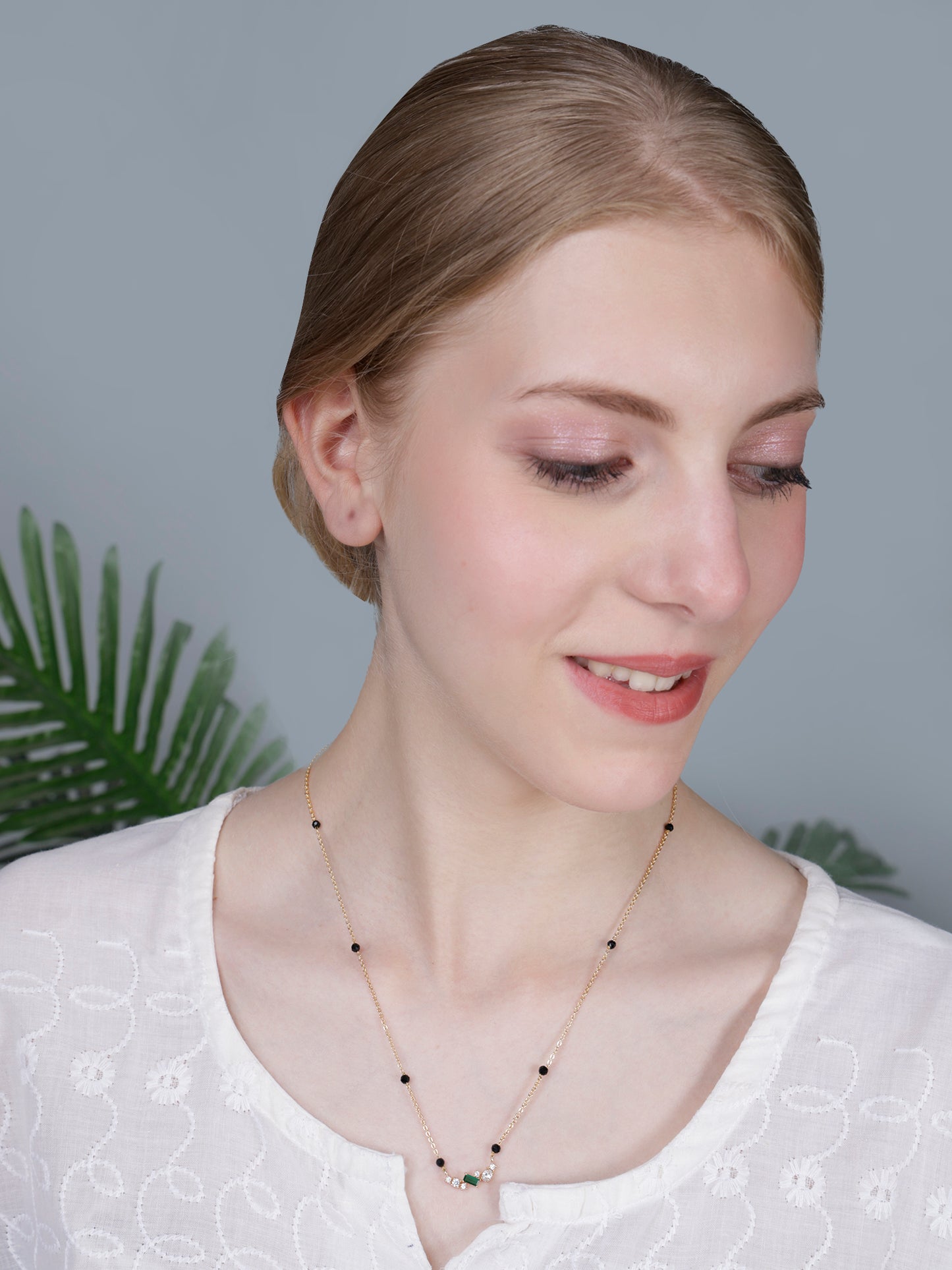 Minimal Black Bead Gold-Plated Mangalsutra with Green Stone & Crystal Accents