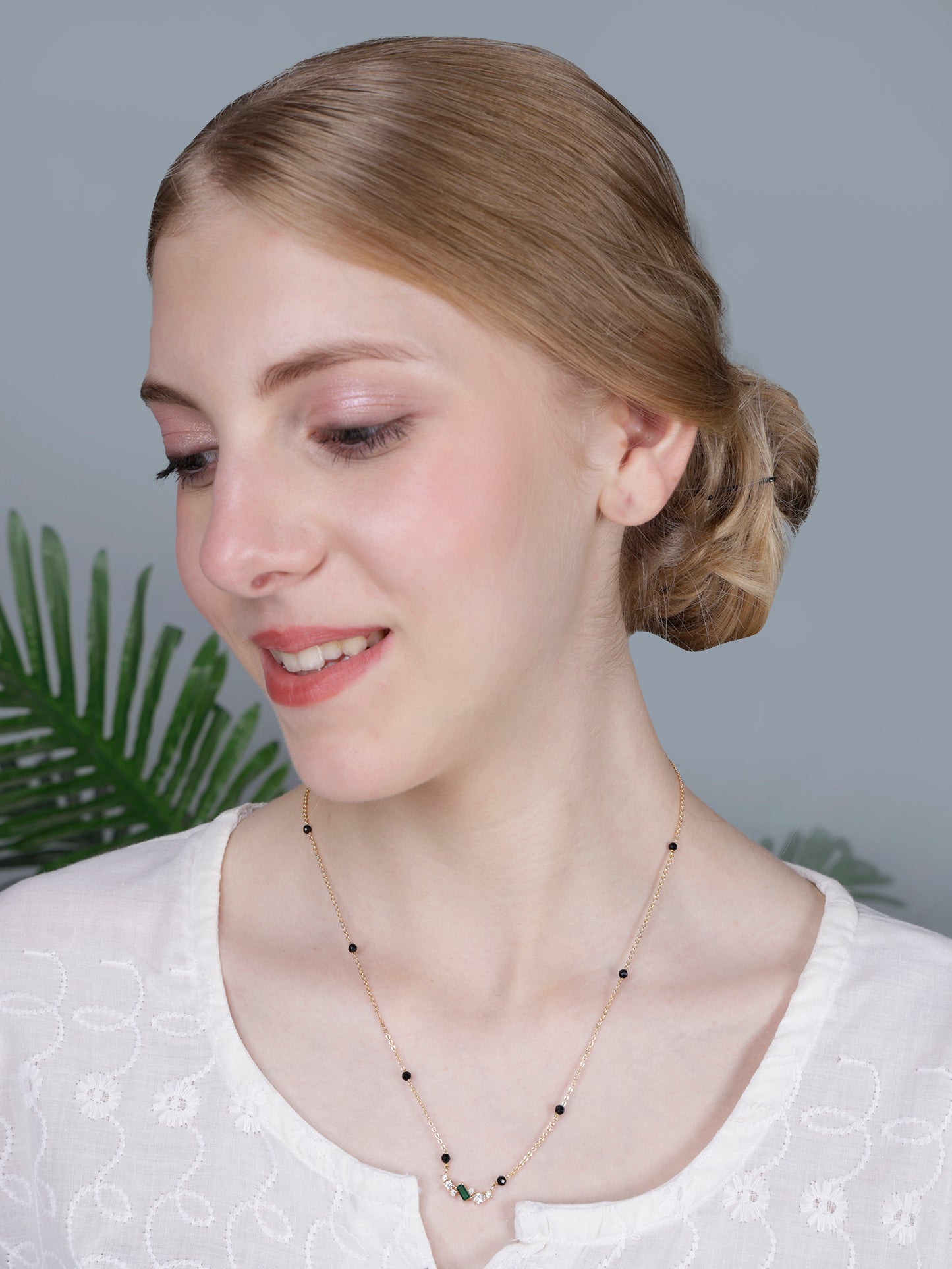 Minimal Black Bead Gold-Plated Mangalsutra with Green Stone & Crystal Accents
