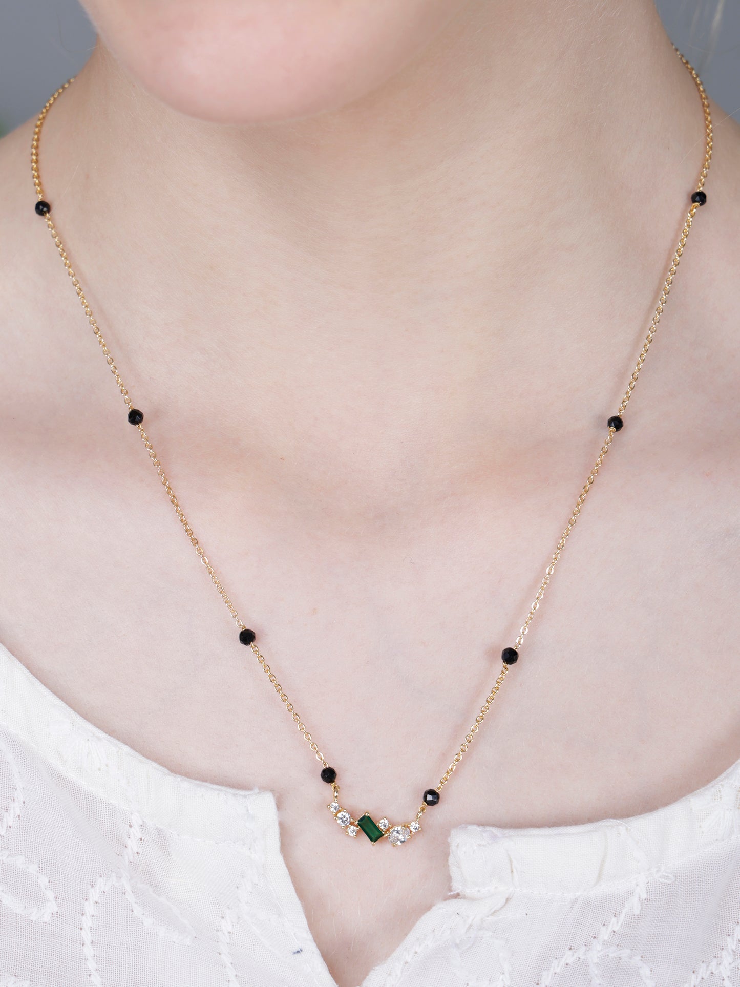 Minimal Black Bead Gold-Plated Mangalsutra with Green Stone & Crystal Accents
