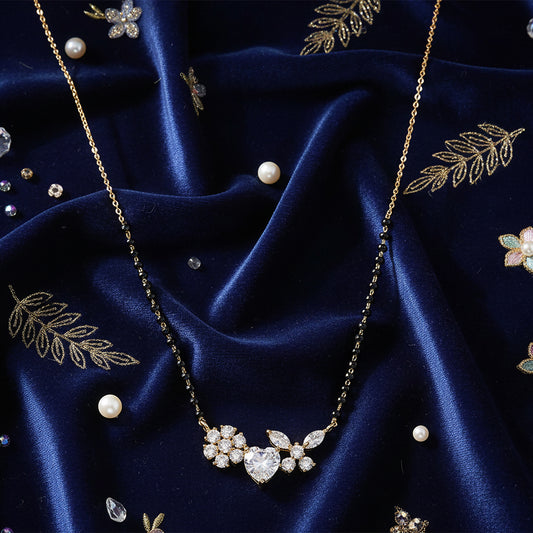 Short mangalsutra designs with heart floral diamond pendant