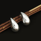 Sculpted Teardrop Stud Earrings in Silver Finish