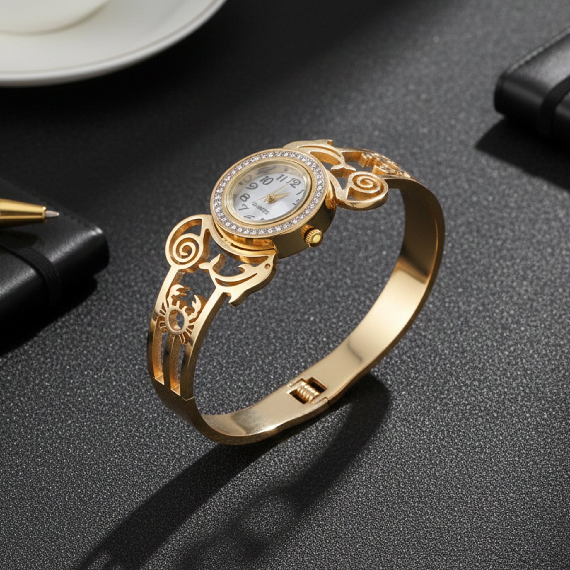 A versatile gold bracelet for women for daily wear featuring a functional quartz watch and comfortable bangle clasp.