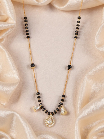 Latest gold-plated mangalsutra design with black beads and a sparkling CZ teardrop pendant on a fine chain