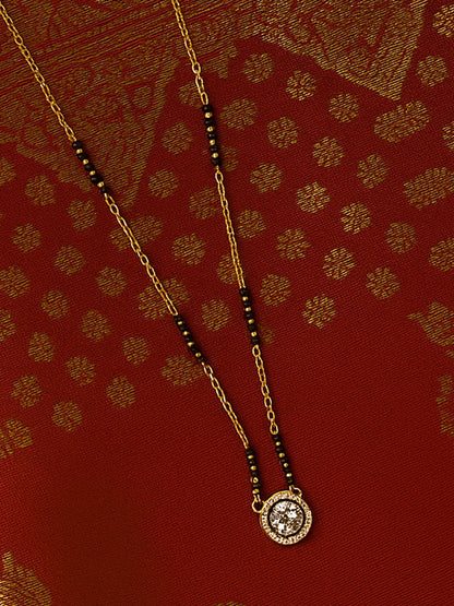 Simple modern mangalsutra design in a short length, with a diamond-look solitaire and minimalist black bead detailing