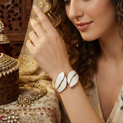 bracelet for women for daily wear shown on a model's wrist with a luxurious white enamel finish.