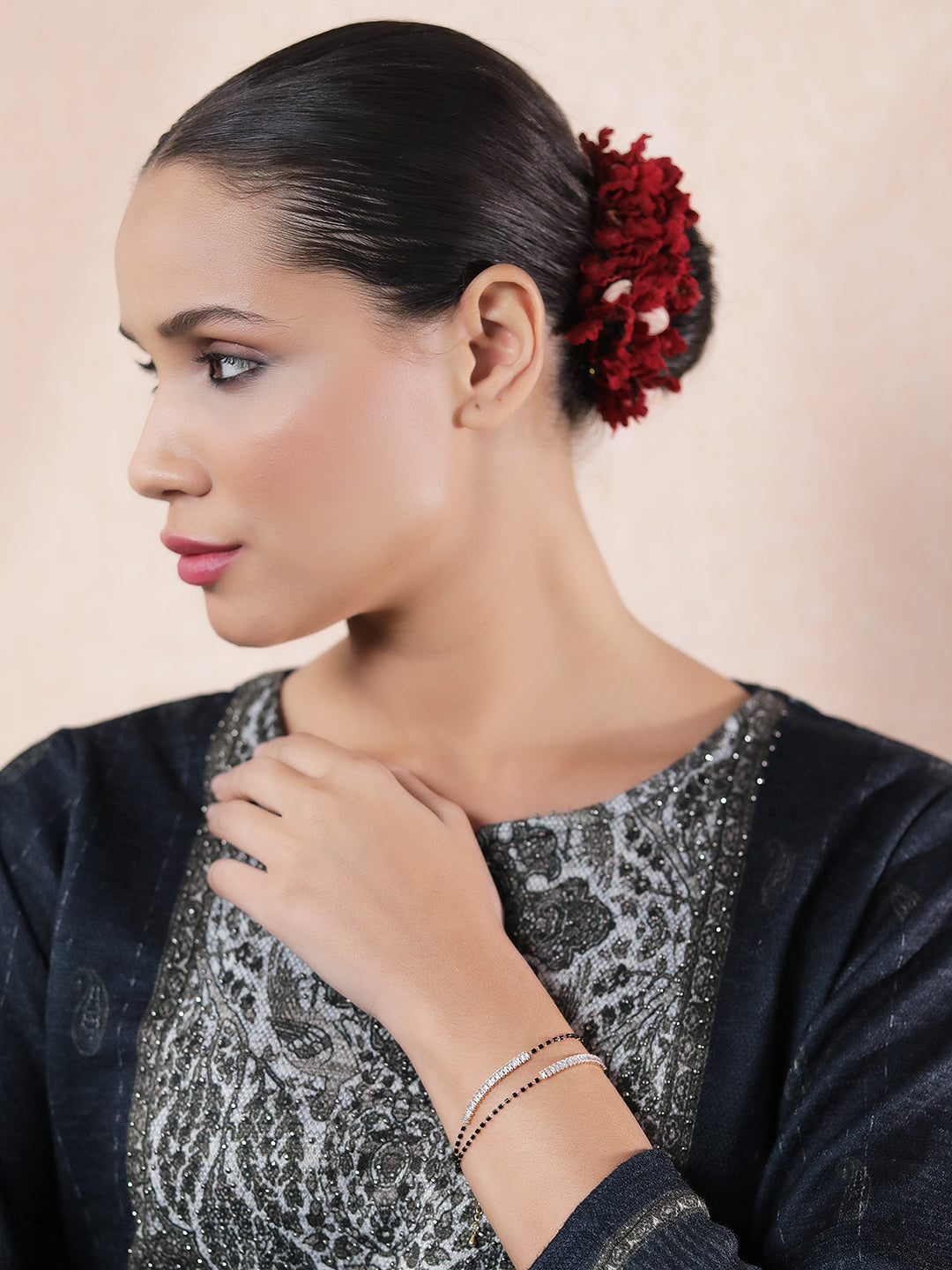 Daily wear gold mangalsutra design on woman.”