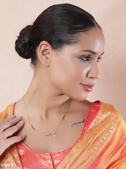 Subtle and simple modern mangalsutra design with a diamond-accented horizontal bar pendant.