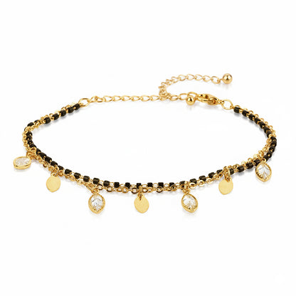 Latest mangalsutra design featuring dual-layer gold chain, black beads, and dangling stone and gold charms
