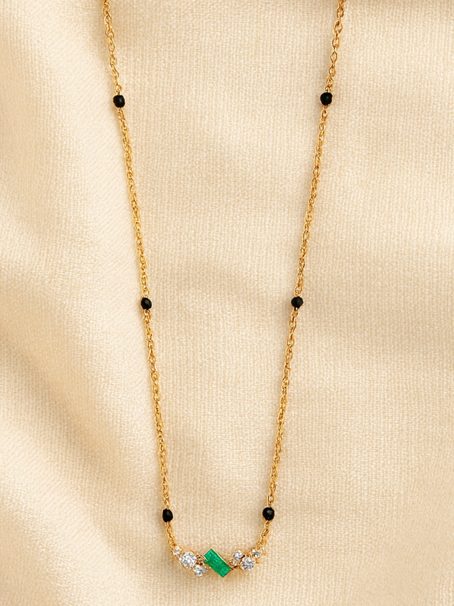Delicate Gold Mangalsutra with Black Beads and Emerald-cut Green Stone Pendant