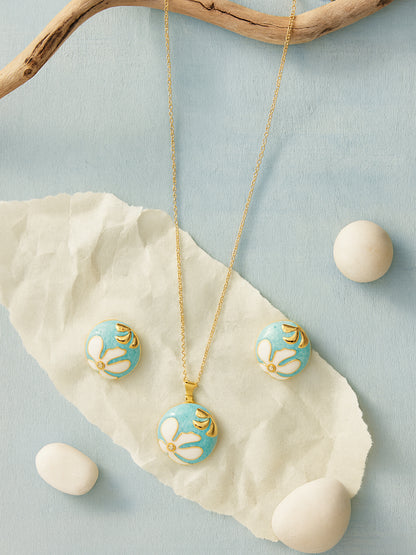 Gold necklace design with a round turquoise and white enamel floral pendant, paired with matching stud earring