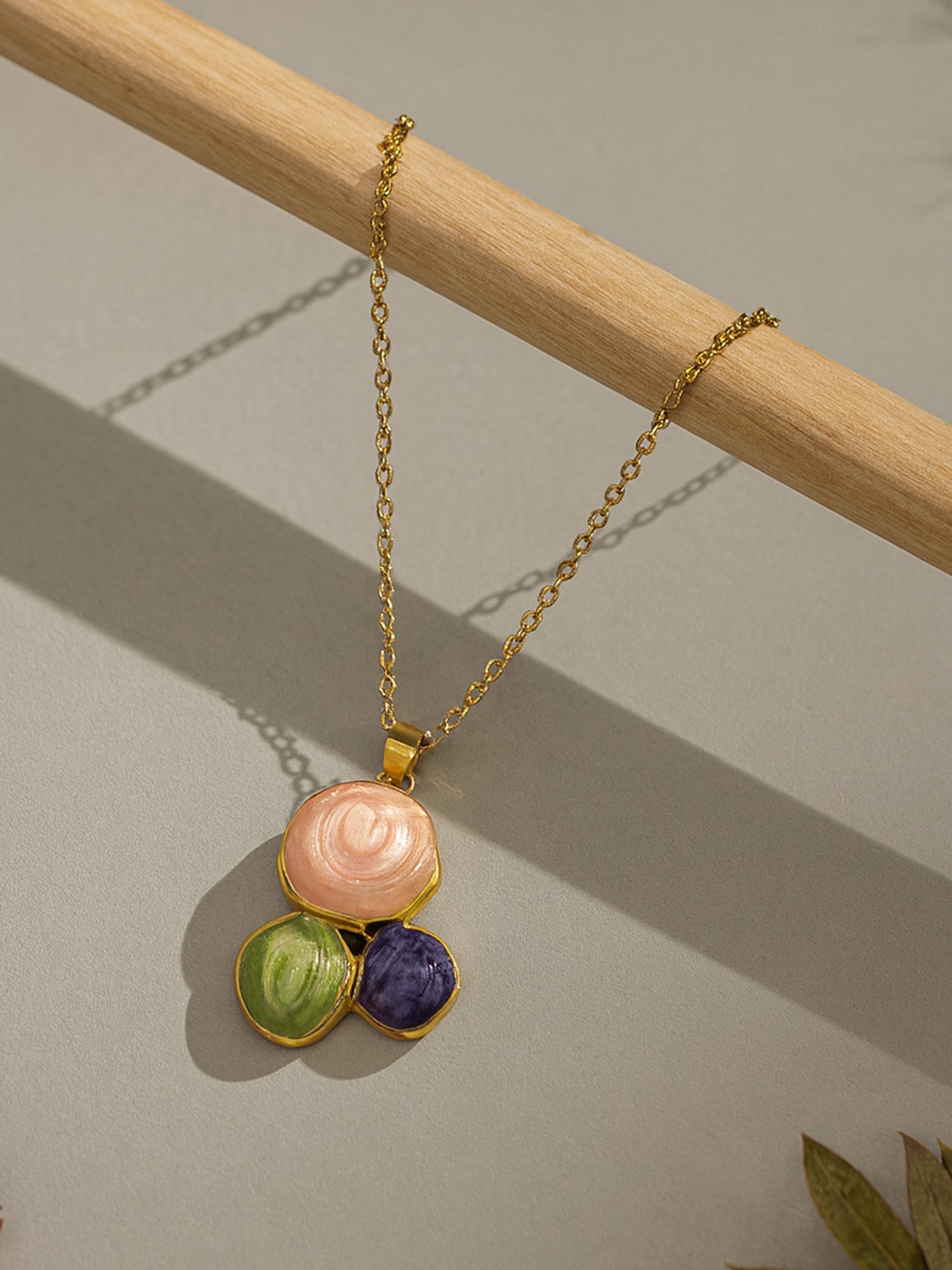 Gold chain with pendant featuring a modern gold plated design suitable for daily and party wear