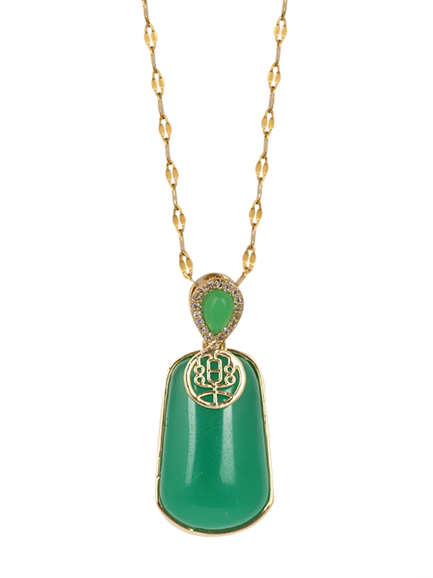 A woman wearing a sophisticated gold chain with pendant gold, featuring a vibrant rectangular green stone and a teardrop accent