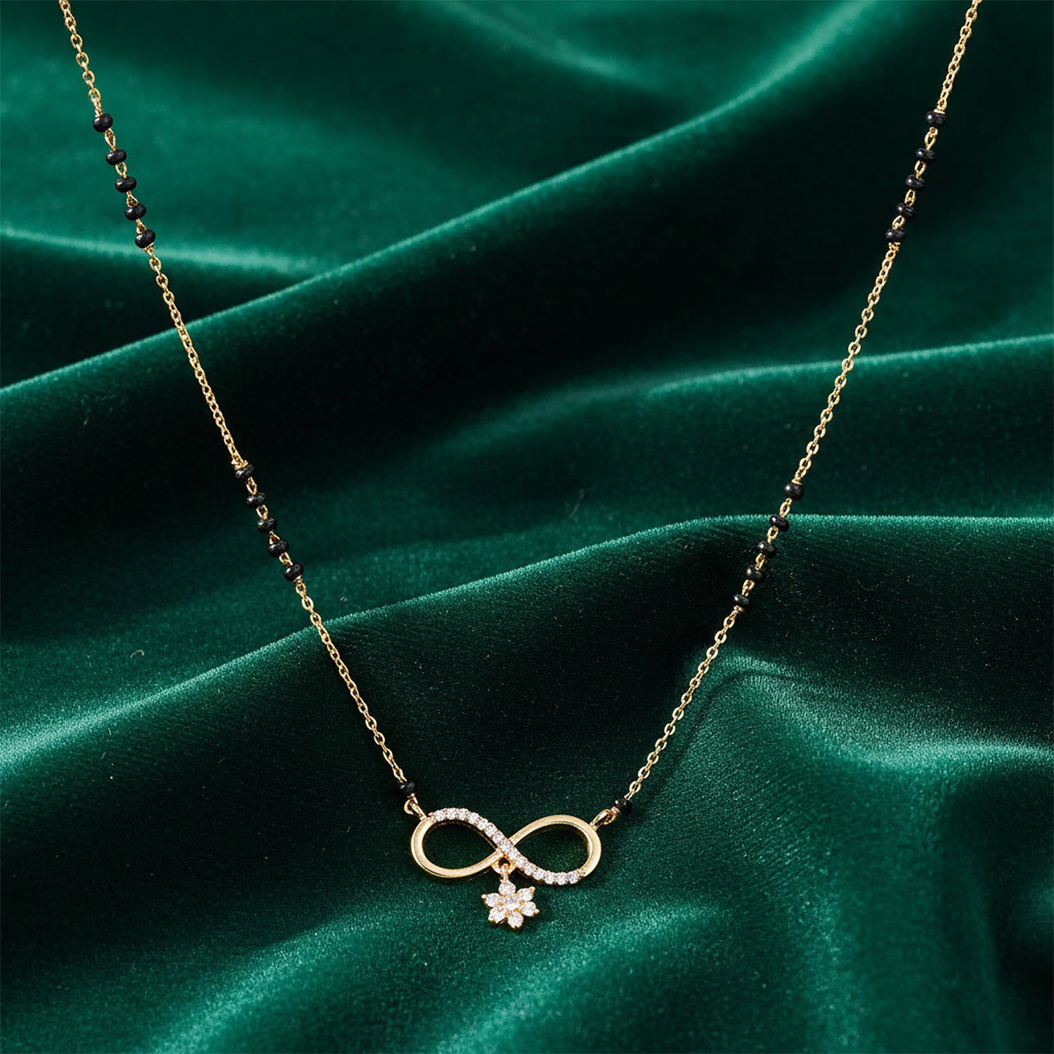 Gold plated infinite mangalsutra design with floral diamond charm