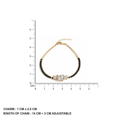 Latest short mangalsutra design bracelet with gold chain, black beads, and a three-stone charm shown with size measurements.