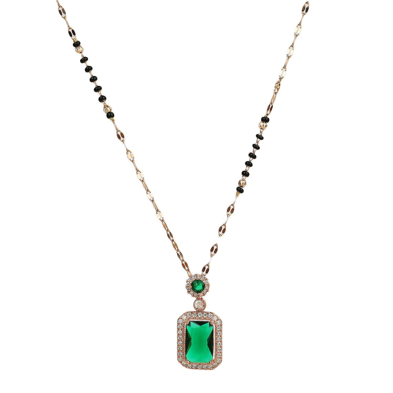Gold Hindu mangalsutra design with black beads and an emerald green pendant on a white background
