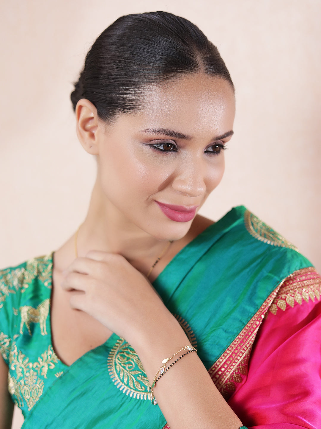 Daily wear mangalsutra design in gold worn with traditional outfit