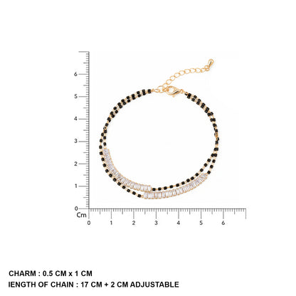 Gold hand mangalsutra bracelet with black beads and adjustable chain displayed with size measurement