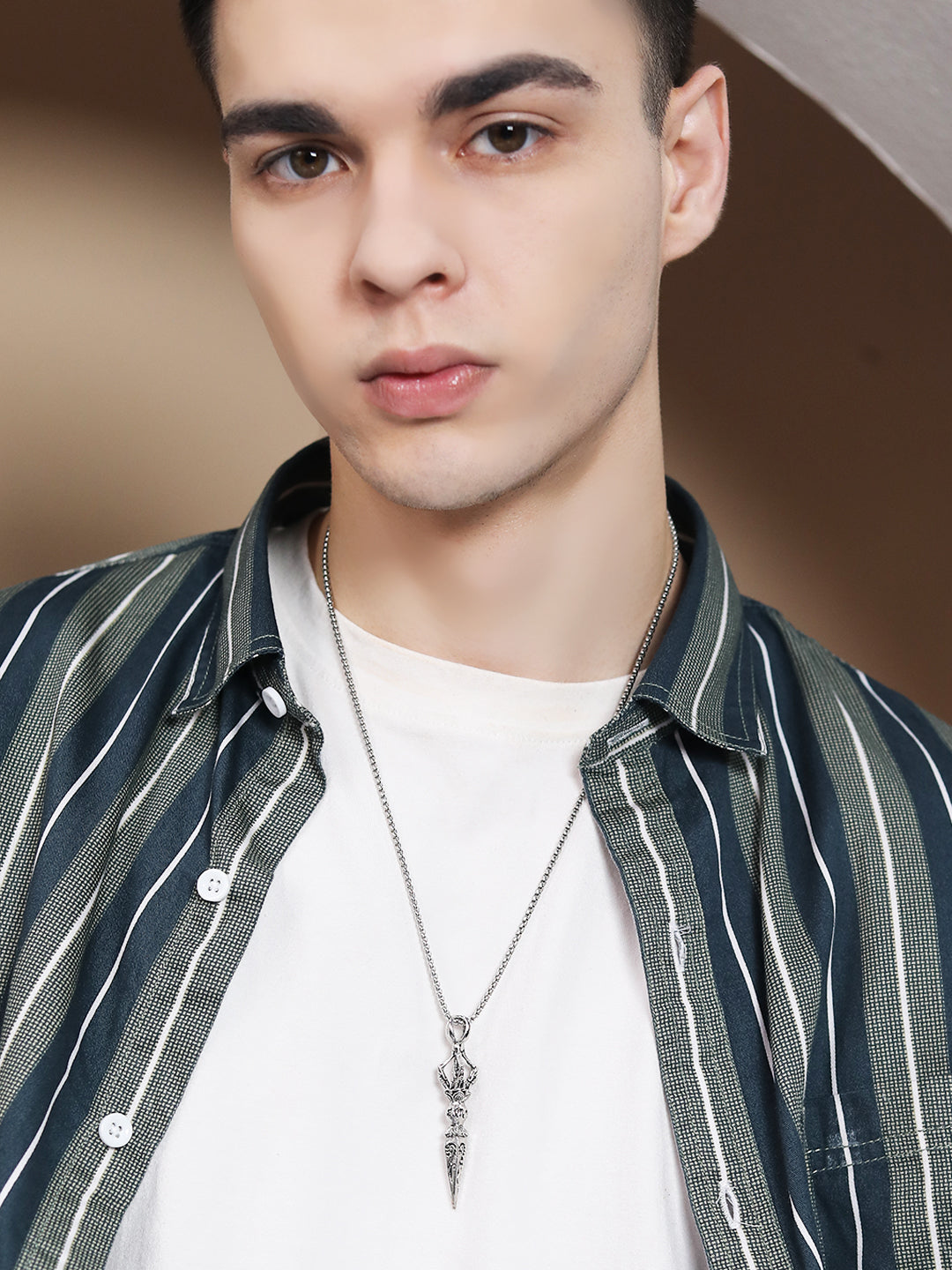 Men’s chain for pendant displayed on white tee and striped shirt