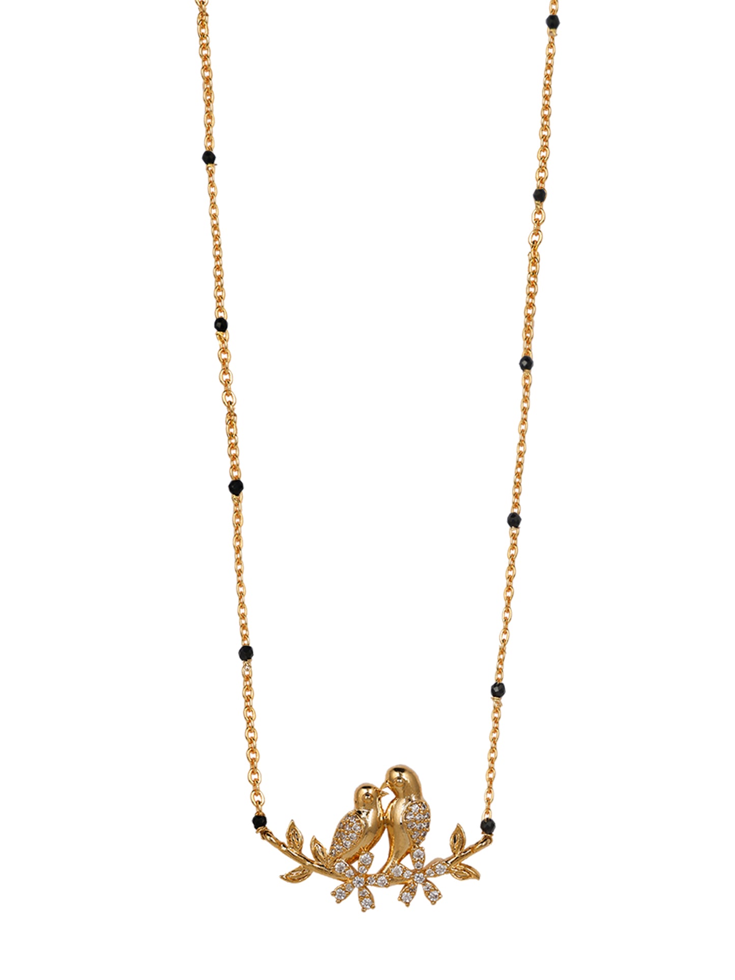Close-up of a new traditional mangalsutra design combining classic black beads with a modern, gold love bird motif pendant