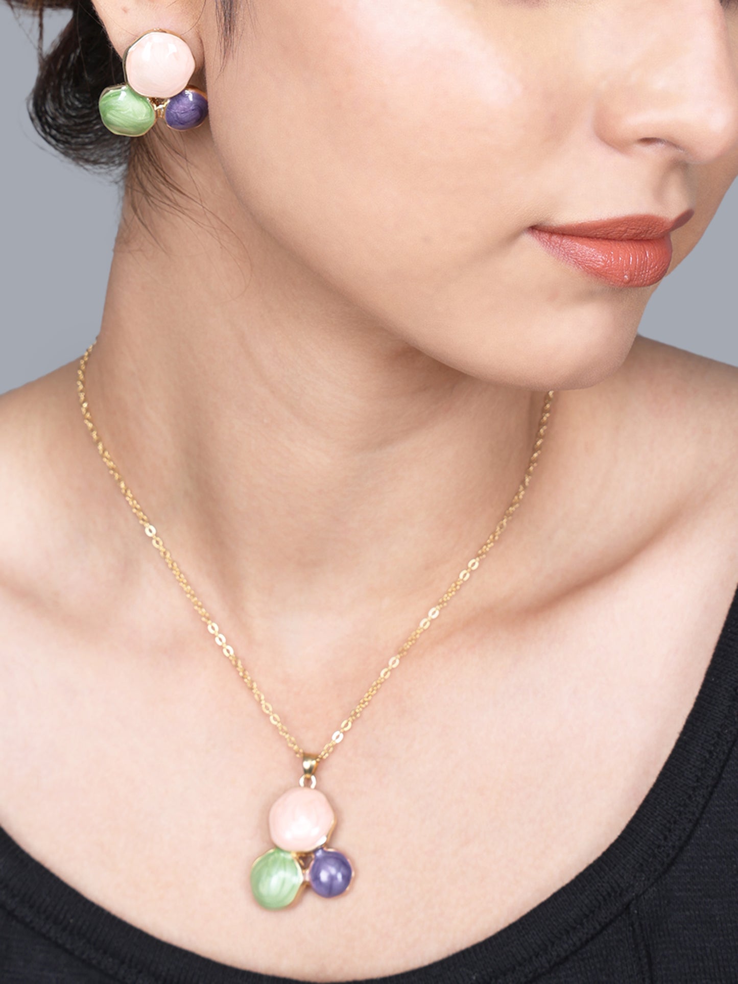 Gold necklace for women styled with matching earrings, showcasing a modern and lightweight gold plated necklace design