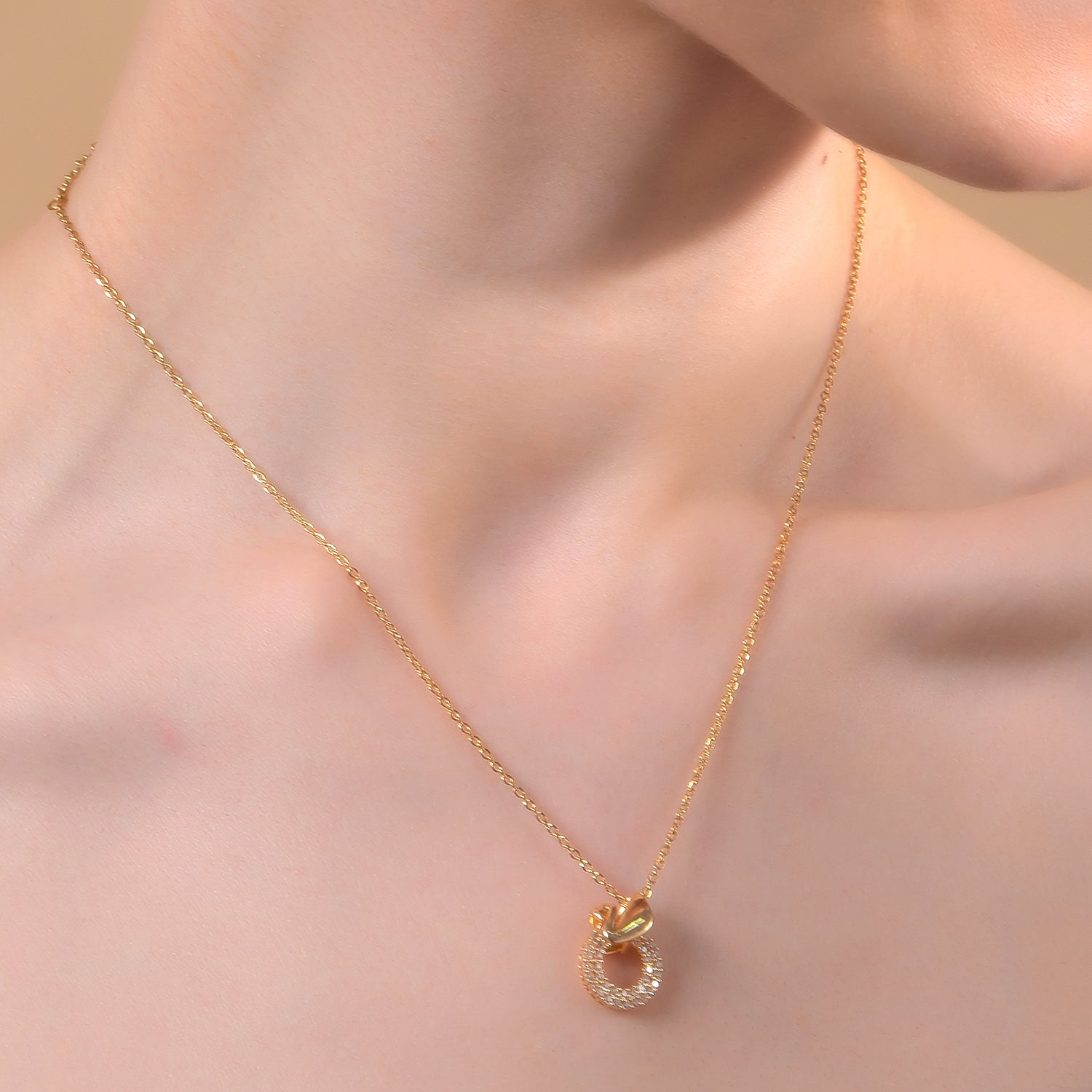 Gold-Tone Circular Charm Necklace with Pave Stones