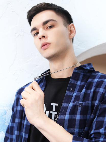 Model holding a pure silver necklace with a minimalist bar pendant.
