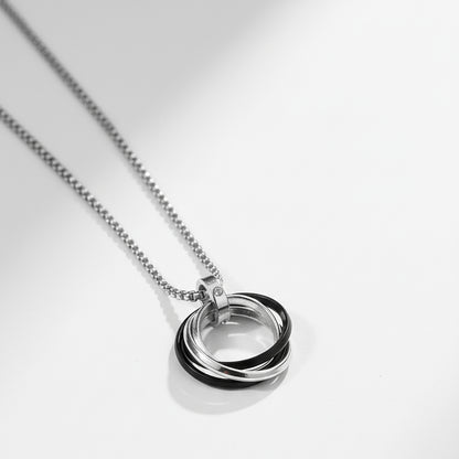Sterling silver necklace with interlocking ring pendant