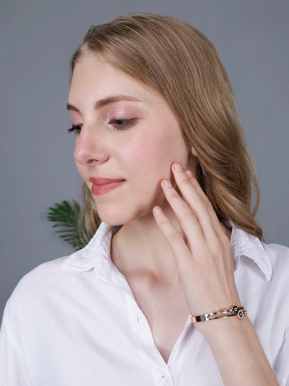 A stylish bracelet for women shown on a model's wrist, illustrating how the slim profile complements everyday fashion.