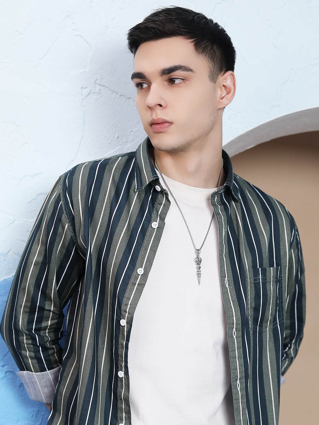 Pendant silver sterling necklace styled on men’s casual outfit