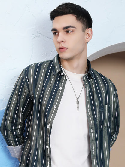 Pendant silver sterling necklace styled on men’s casual outfit