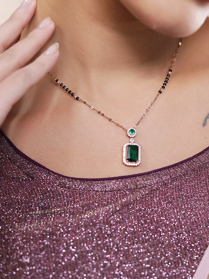 Simple modern gold mangalsutra with emerald pendant