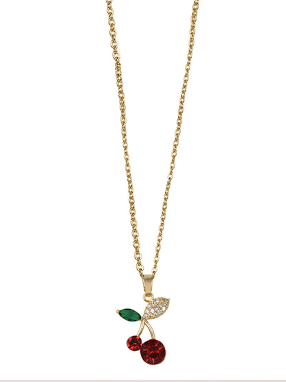 Close-up of modern gold necklace designs showing a gold-tone cable chain and a sparkling cherry-shaped charm