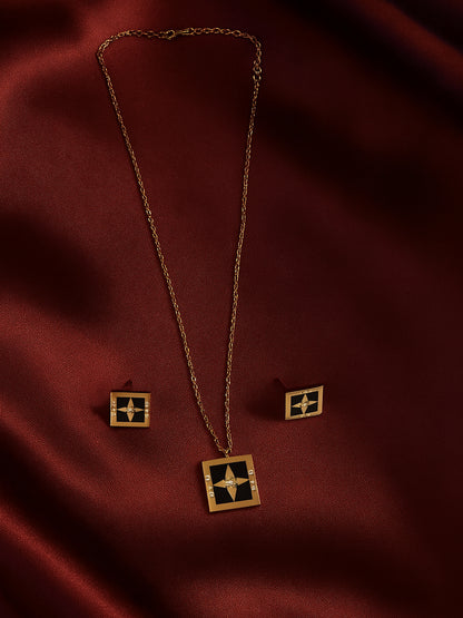 Small gold necklace design featuring a black enamel square pendant with a compass star and rose gold-tone chain and earring
