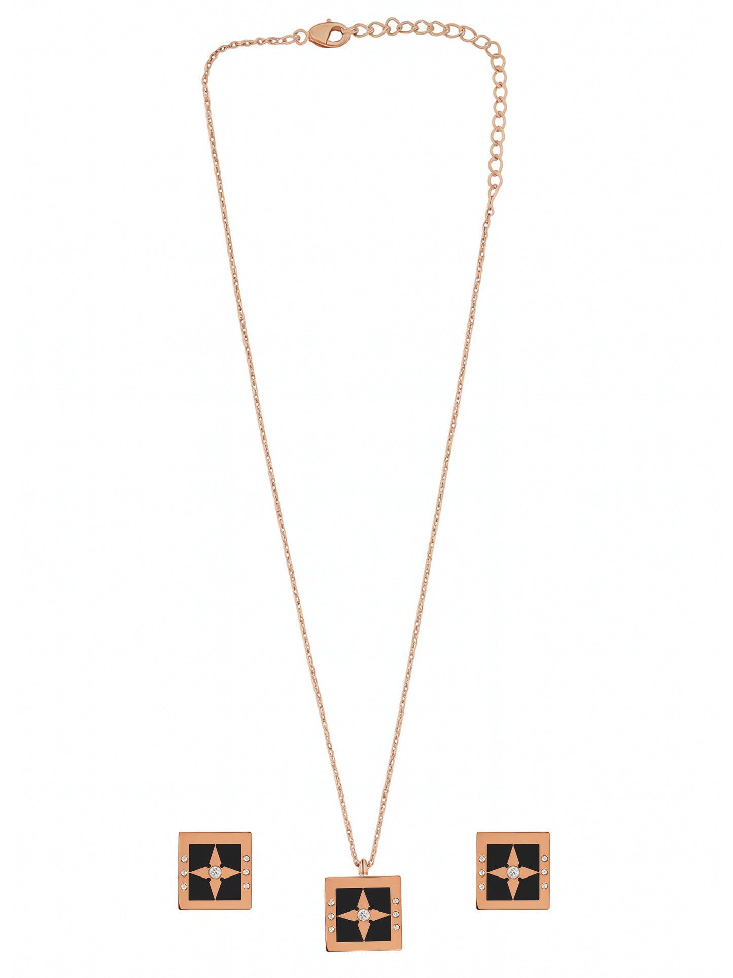 Rose gold chain with pendant featuring a square black enamel and crystal compass-star design, and matching stud earrings