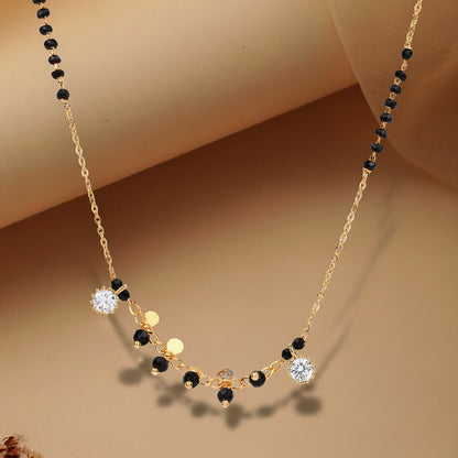 Gold plated mangalsutra design with black beads and sparkling stone charms