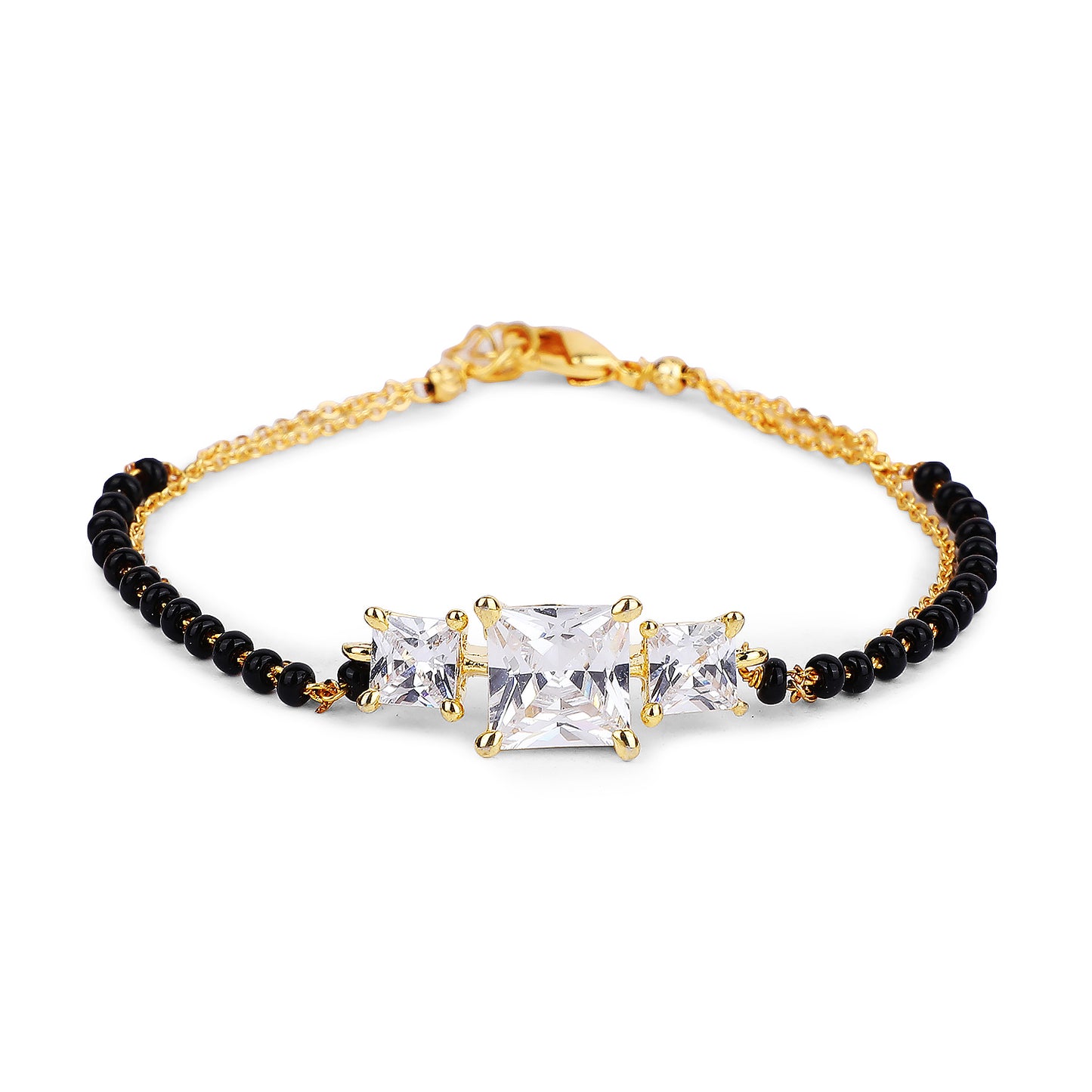 Stylish design of mangalsutra bracelet featuring gold chain, black beads, and three sparkling square stones displayed on a white background.