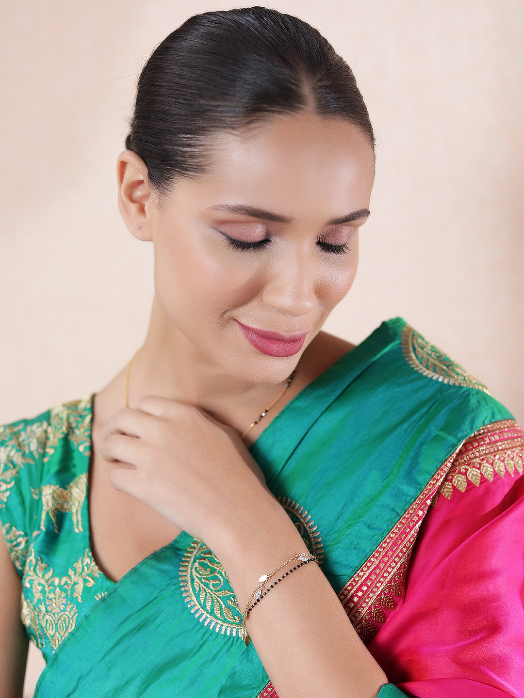 Latest short mangalsutra design worn with traditional attire