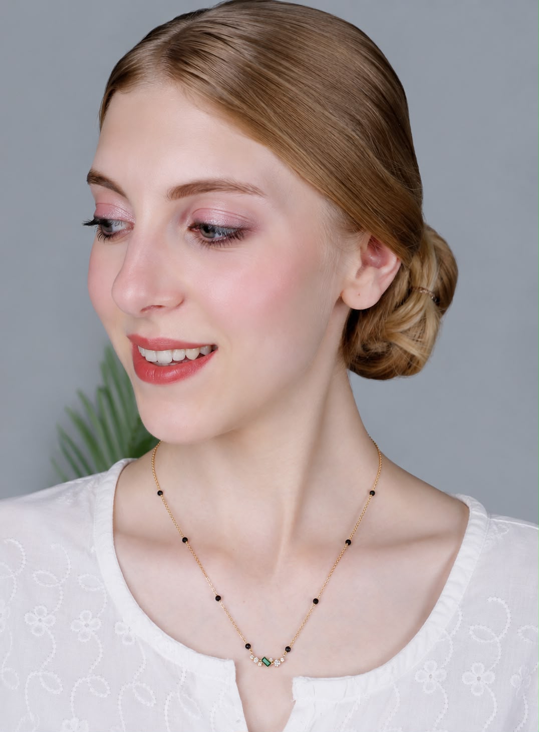 Minimal Black Bead Gold-Plated Mangalsutra with Green Stone & Crystal Accents