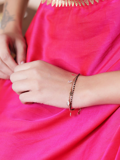 Traditional mangalsutra design bracelet worn on wrist