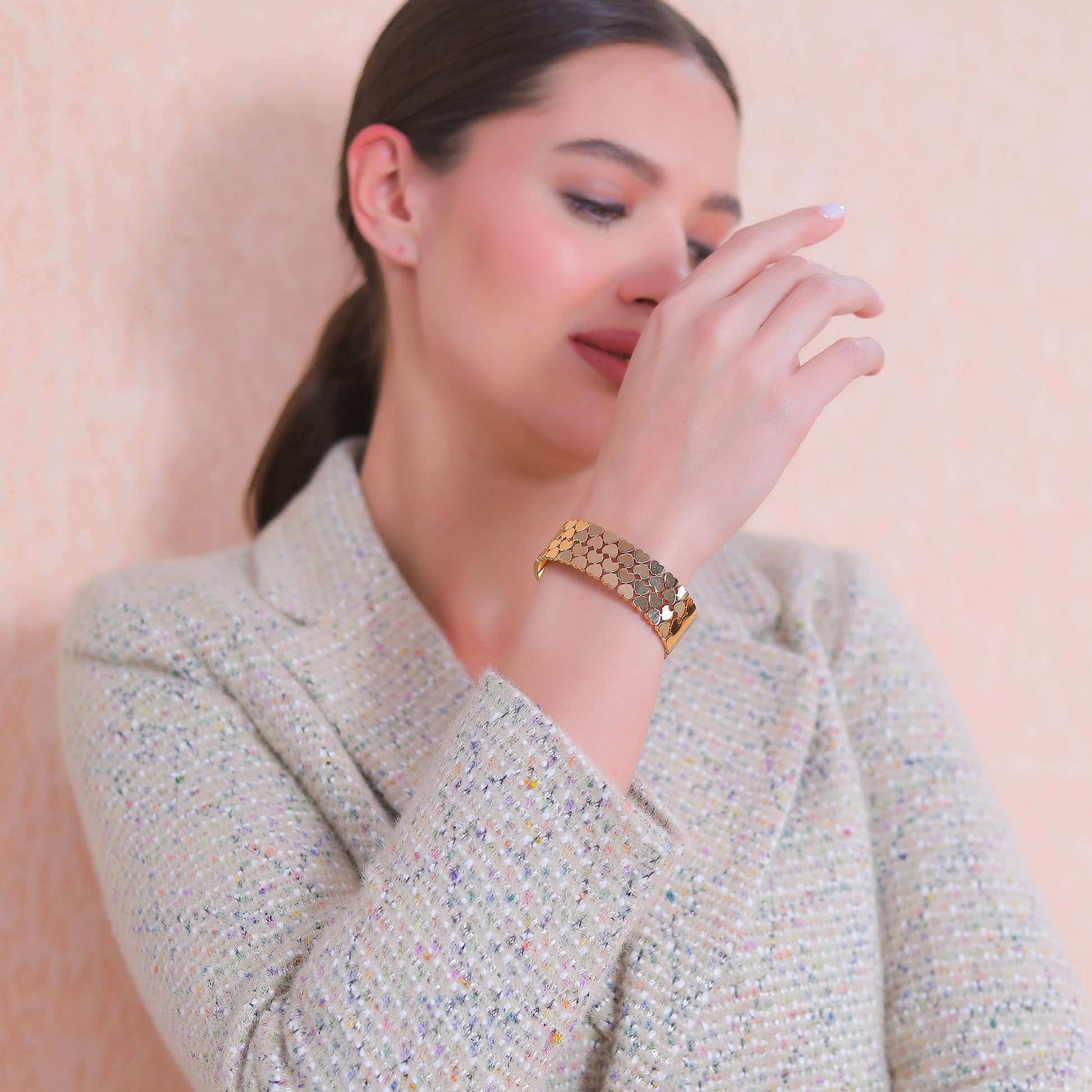 Lifestyle shot of a simple bracelet for women that adds a touch of elegance to a modern outfit.