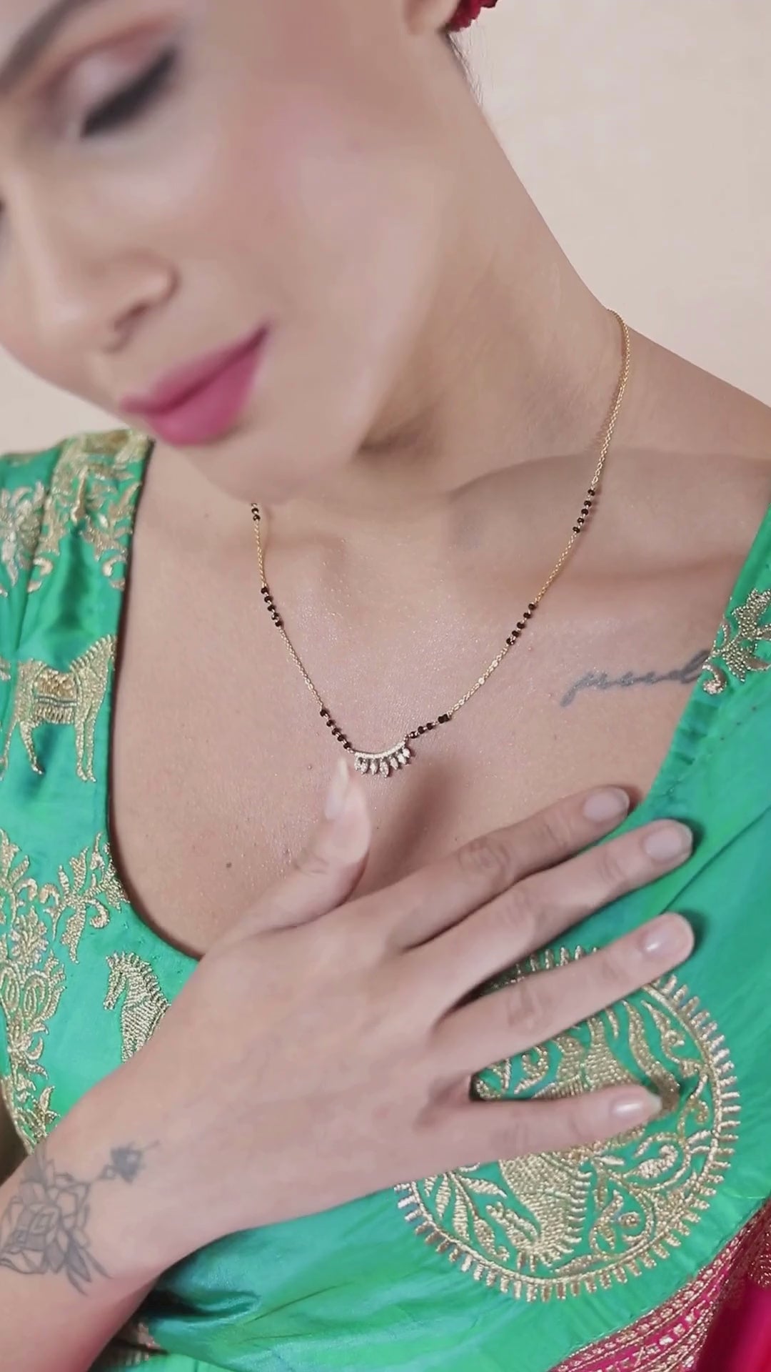 Crescent-shaped pendant video